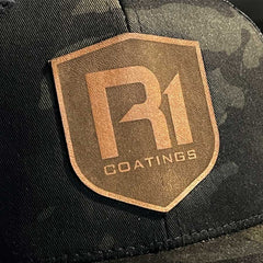 R1 Leather Patch Camo Trucker Hat